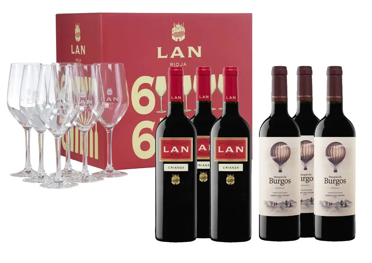 Caja roja con seis copas y botellas de vino tinto, incluyendo tempranillo vino de Rioja y Ribera del Duero.
